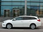 Toyota Auris Touring Sports Hybrid 2013 года (UK)